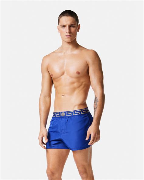 versace blue swim shorts|greca border swim shorts.